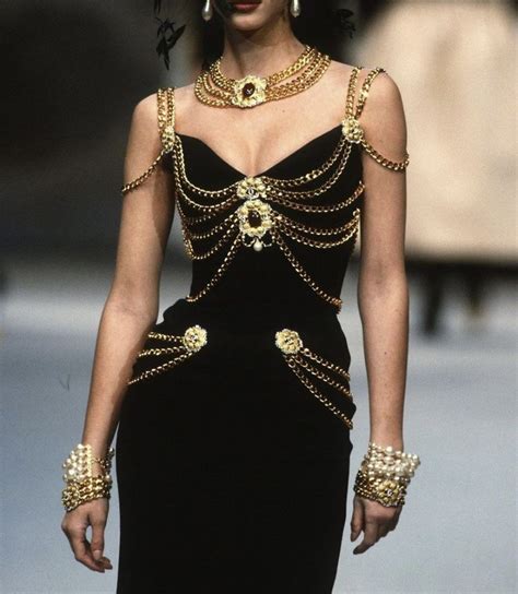 chanel black dress with gold chain|Chanel dress with gold chains.